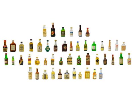 A collection of miniatures.  Approximately fifty. Including a Scapa pure malt, eight years old, a Haig gold label scotch whis