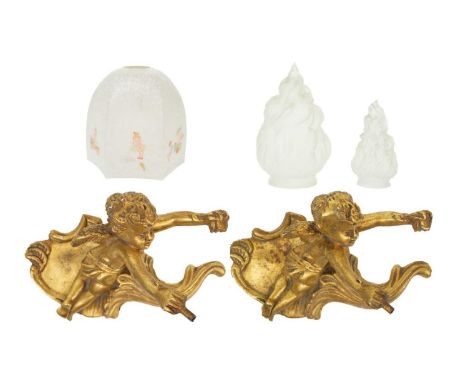 A pair of gilt plaster cherub wall lamps. 20th century, on scroll mounts, devoid of fittings, height 23cm, together with two 