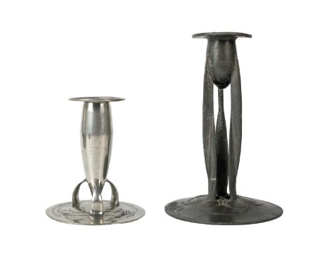 A Liberty Heritage candlestick. Impressed mark to base limited 7/250 9807, height 14.5cm together with a drilled pewter candl