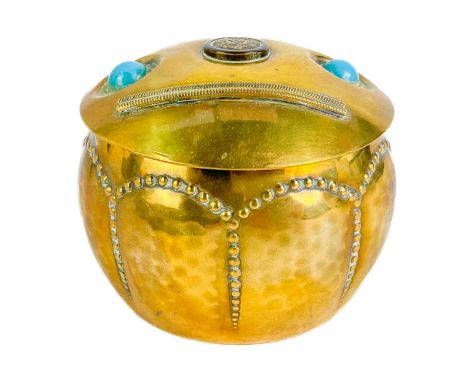 A Jugendstil brass circular box Ignatius Taschner's makers mark. Mounted with turquoise stones, copper Chinese button applied