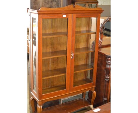 STAINED OAK DOUBLE DOOR BOOKCASE WITH UNDER SHELF     