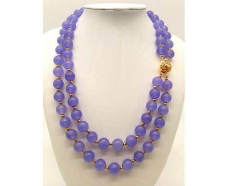 A Two-Row Lavender Jade Bead Necklace - gold plated clasp. 44cm 