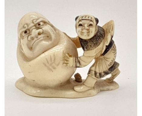 A 19TH CENTURY JAPANESE VERY RARE IVORY NETSUKE. 3cms in height. 