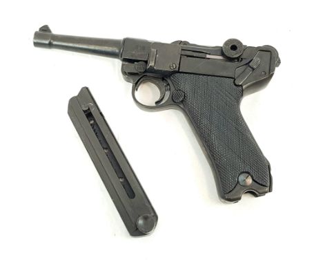 A Vintage Reproduction German Luger P-08 Pistol, full working action and field strippable. 