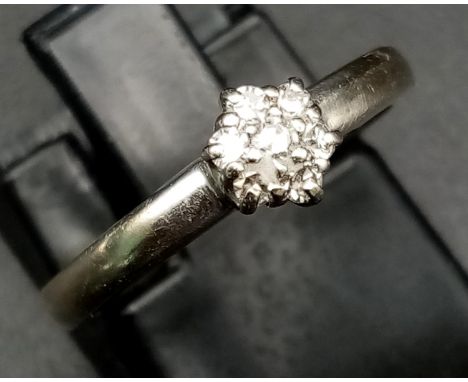 An 18 K yellow gold ring with a single diamond. ring size: H, weight: 2.7 g. 