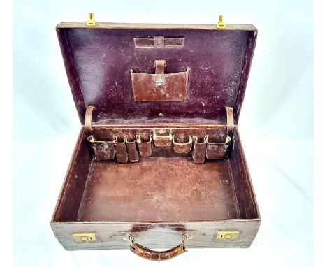 A Vintage Asprey Crocodile Skin Travelling Suitcase - With Original Locking System. A Solid case with internal compartments. 