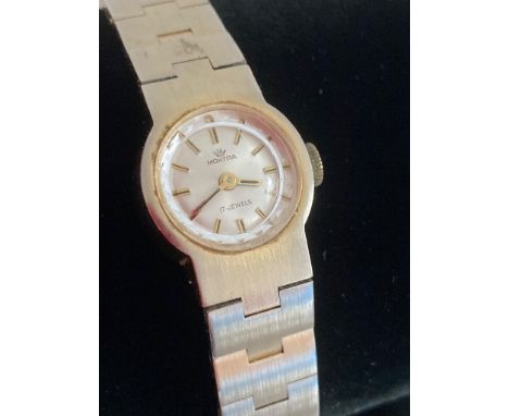 Vintage ladies Montra 1950/60?s wristwatch in silver tone having small silver face showing 17 jewels, manual winding in full 