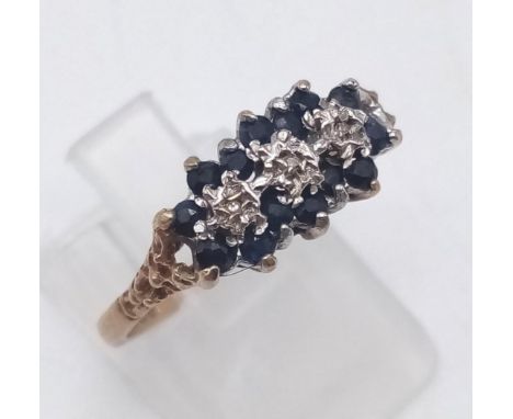 A 9 K yellow ring with blue sapphires and diamonds. Ring size: N1/2, weight: 2.1 g. 