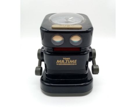 A Vintage Tomy Mr Time Alarm Clock Robot. 15cm tall.As found. 