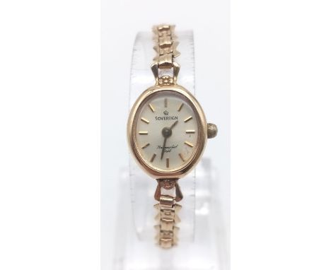 A Vintage 9K Gold Ladies Sovereign Watch. Gold strap and case. In working order but as found. 8.09g total weight.