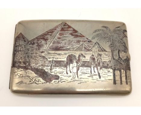 An Early Solid Silver and Enamel Middle-Eastern Cigarette Case. Beautiful Egyptian themed decoration throughout. 12 x 8cm. 12