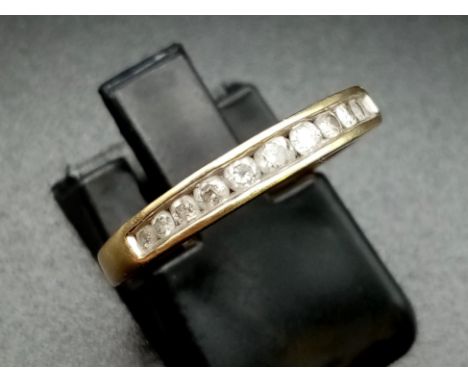 An 18K Yellow Gold Diamond Half-Eternity Ring. 0.25ct.Size K. 2.1g. 