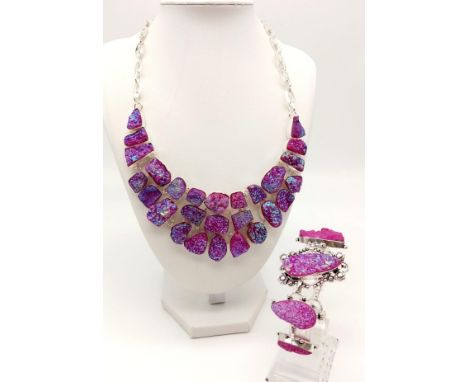 A mesmerising necklace and bracelet set, consisting of natural quartz crystal clusters covered with iridescent Titanium Oxide