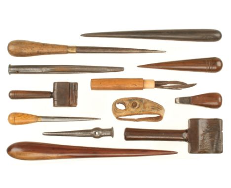 A selection of sailmakers tools incl. 2 lignum serving mallets, 3 fids, seam rubber, sailors palm etc G