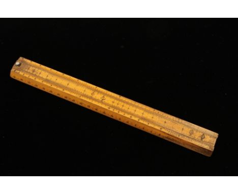 A French boxwood slide rule by TAVERNIER GRAVET Rue Mayet 19 Paris with paper scales under G