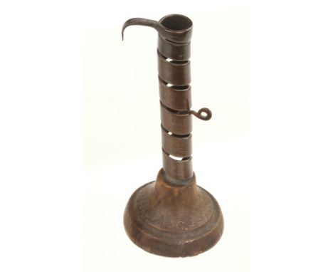 An early French adjustable candlestick carved J.J.Ferma Mt. Adam Aug 22 1898 on wooden base G+