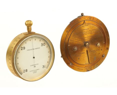 A rare large size Compensated Forecasting Aneroid barometer complete with a brass Forecasting dial by NEGRETTI & ZAMBRA Londo