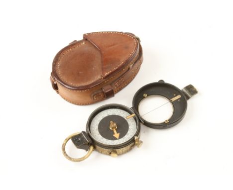 A small prismatic compass by MARTIN & SIMS also marked B-L No 31349-1915 in leather case (Jay Gaynor collection) G+