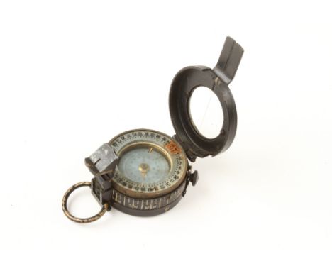 A prismatic compass by G.E.C. and a pocket compass by J.H.STEWARD (Jay Gaynor collection) G