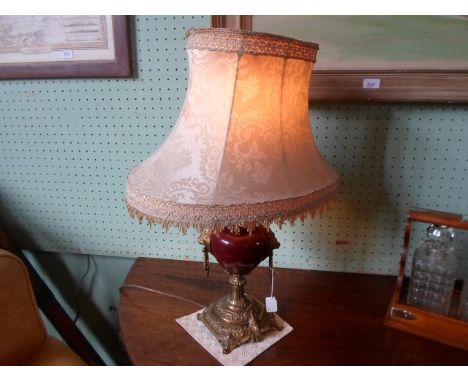 A pair of ceramic and gilt mounted table lamps, 63cm to include shade.   Condition Report:  No apparent damage or restoration