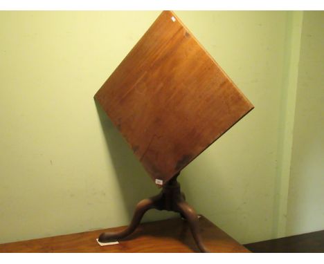 A 19th century mahogany tilt-top table of square form on tripod base, 61cm².