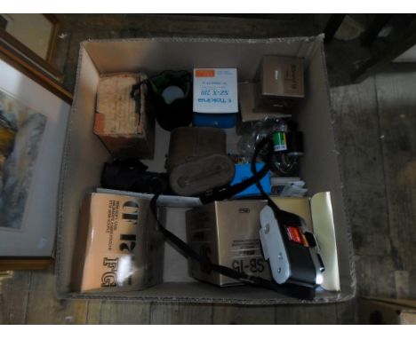 A collection of cameras, camera equipment and accessories, to include a Nikon FG camera, and Ensign camera no. E29, a Tokina 