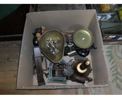 A mixed lot to include: a set of cast iron scales, a reproduction miniature longcase clock, hardwood carved animals and other