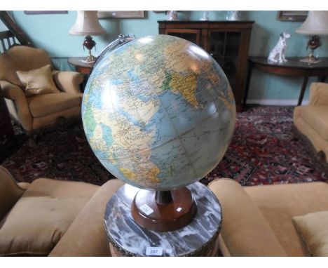 A Philip's Challenge Globe, scale 1:37, 500.000, London Geographical Institute 1963, the globe mounted to circular wooden bas