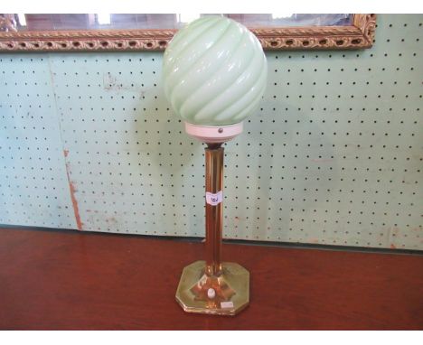 An Art Deco-style table lamp of columnar form, having a green tinted opaline shade, 48cm.