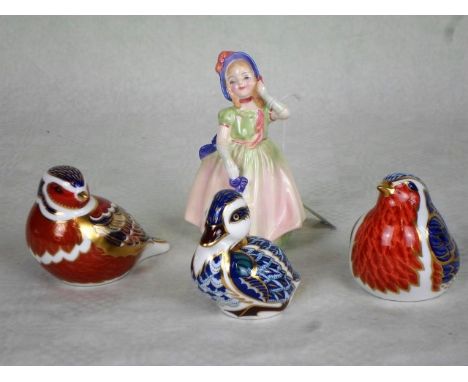 A Royal Doulton ceramic figurine, Babie (HN1679), together with three Royal Crown Derby paperweights, each modelled as birds,