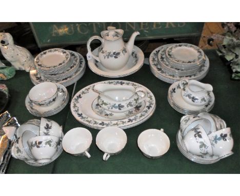A Royal Doulton Burgundy pattern part-dinner service, numbered TC1001, comprising: oval serving dishes, coffee pot, cups & sa