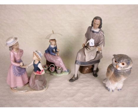 Four Nao figures, to include an owl and another modelled as a girl carrying a parasol, the tallest 28cm.