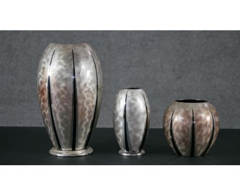 A collection of Art Deco Ikora silver plated pieces by WMF, three vases of various sizes with black enamel slash design, make