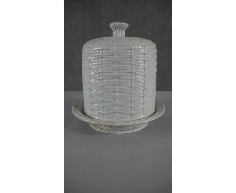 A 19th century woven design white ceramic lidded cheese cloche. H.30 W.30cm 