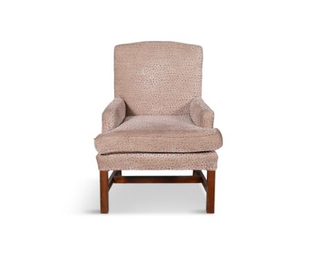 A MAHOGANY FRAMED ARMCHAIR,upholstered in pink and gold animal print upholstery. 100cm high