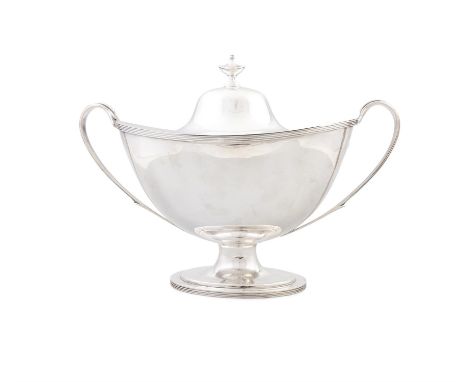 A SILVER GEORGE III STYLE HELMET SHAPED SOUP TUREEN AND COVERSheffield, 1906, William Hutton & Sons Ltd, with twin handles an