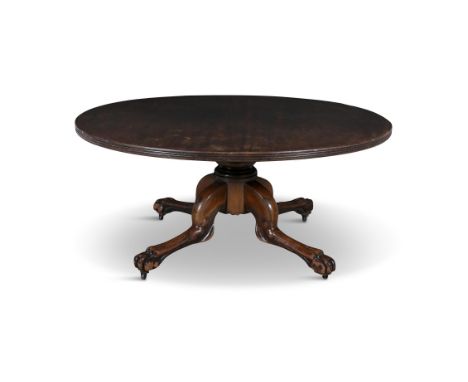 A LARGE VICTORIAN MAHOGANY CIRCULAR BREAKFAST TABLE, the solid panel top with reeded edge, on a heavy turned centre-pillar an