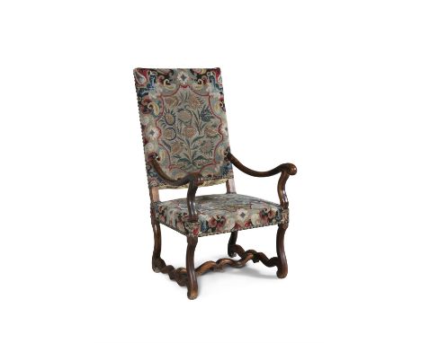 A 17TH CENTURY STYLE FRUITWOOD FRAMED UPHOLSTERED ARMCHAIR, the rectangular panel back and seat covered in tapestry cloth and