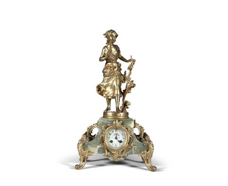 AN ONYX AND GILTMETAL FIGURAL MANTLE CLOCK, C.1900,surmounted by a figure of a girl picking flowers titled 'Flaisir d'Ete' ab