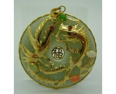 A 14ct gold mounted jade dragon pendant set with coloured stones