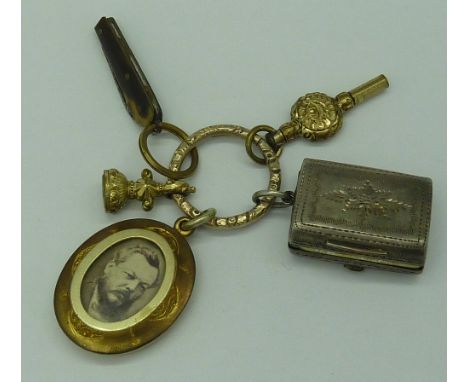 A small novelty silver vinaigrette, hallmarked Birmingham 1833, miniature tortoiseshell pen knife, yellow metal Victorian loc