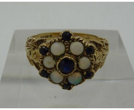 A 9ct gold, opal and sapphire ring, weight 2.8g, size P