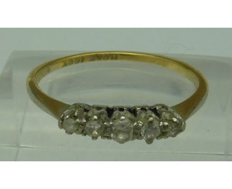 An 18ct gold five stone diamond ring, weight 2.3g, size R