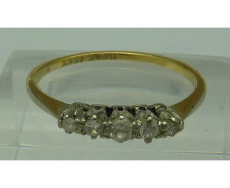 An 18ct gold five stone diamond ring, weight 2.3g, size R