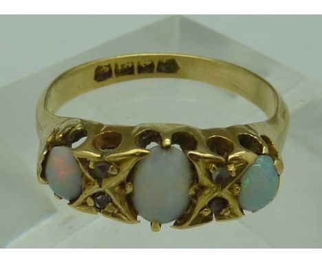 An 18ct gold, opal and diamond ring, weight 4.2g, size L