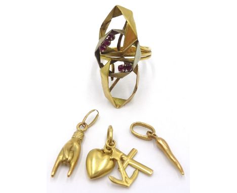 Three 18ct gold charms and a ruby set ring approx 7gm Condition Report Click here for further images, condition, auction time