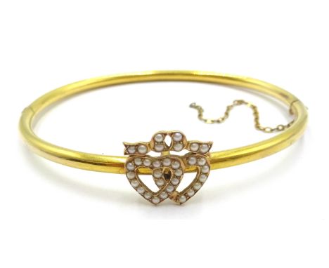 14ct gold hinged bangle with seed pearl hearts detail Condition Report tested to 14ct7gmClick here for further images, condit