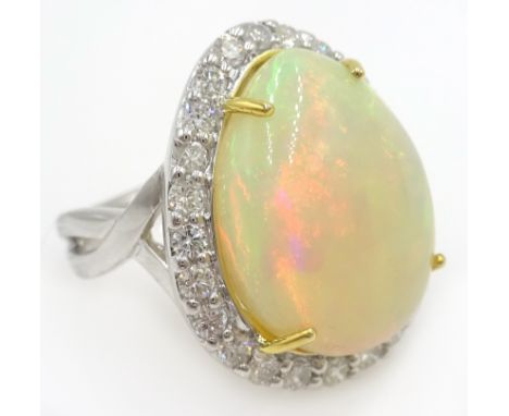 18ct white gold pear shaped opal and diamond cluster ring, stamped 750, opal approx 10.6 carat, diamonds approx 1 carat Condi