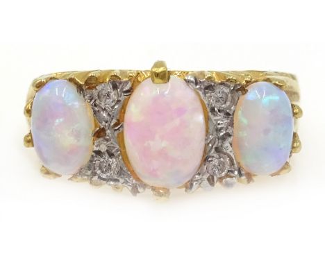 Silver-gilt three stone opal dress ring Condition Report Click here for further images, condition, auction times & delivery c