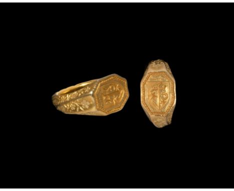 Early 16th century AD. A substantial and important gold signet ring comprising a D-section hoop, facetted shoulders and octag